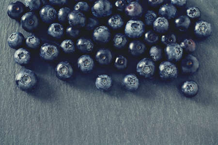 blueberries on stone boardの写真素材