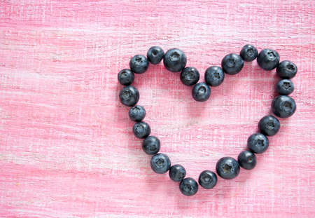 blueberries on wooden surfaceの写真素材