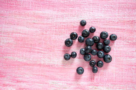 blueberries on wooden surfaceの写真素材