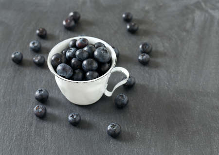 blueberries on stone boardの写真素材