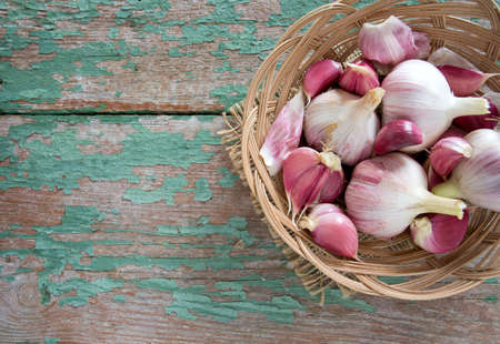 fresh garlic on wooden surfaceの写真素材