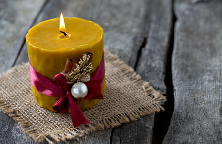candle on wooden surfaceの写真素材