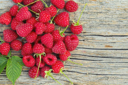 raspberry on wooden surfaceの写真素材