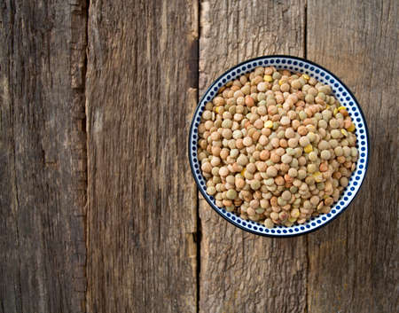 lentils on wooden surfaceの写真素材