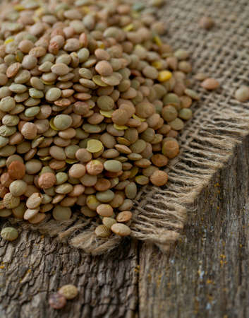 lentils on wooden surfaceの写真素材