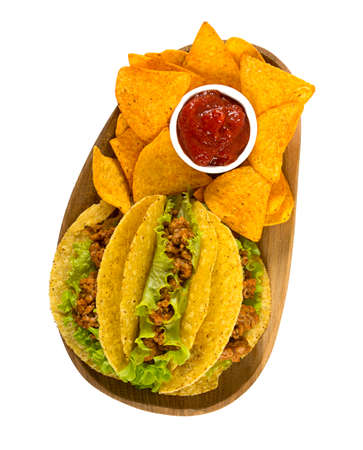 plate with tacos and nachos isolated on whiteの写真素材