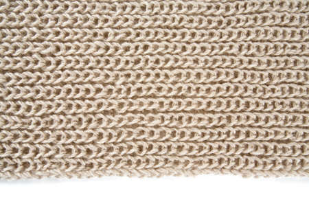 grey hand knitted scarf close up