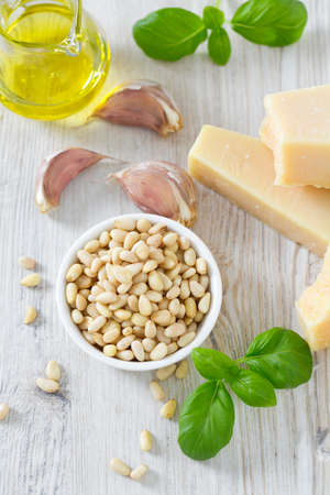 pesto ingredients on wooden surfaceの写真素材