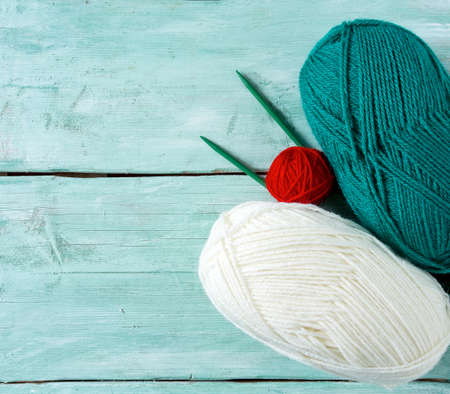 knitting yarn hanks on wooden surfaceの写真素材