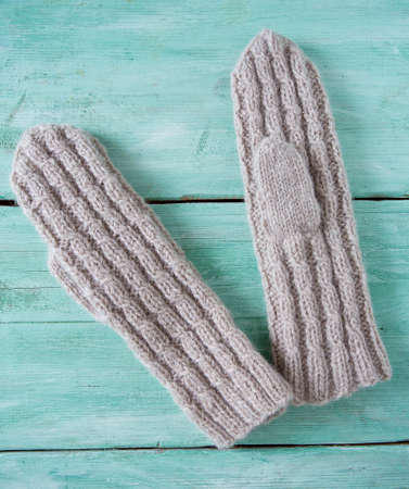 hand knitted mittens with braidsの写真素材