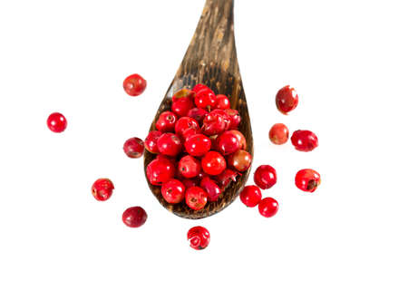 red peppercorns isolated on white background