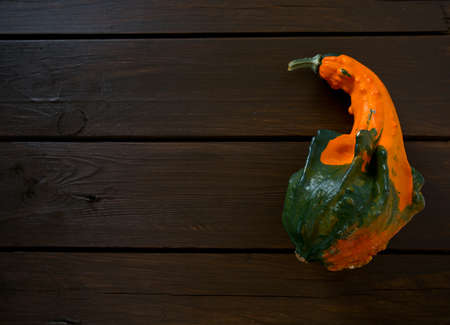 decorative pumpkins on wooden surfaceの写真素材
