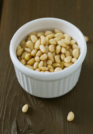 pine nuts on wooden surfaceの写真素材