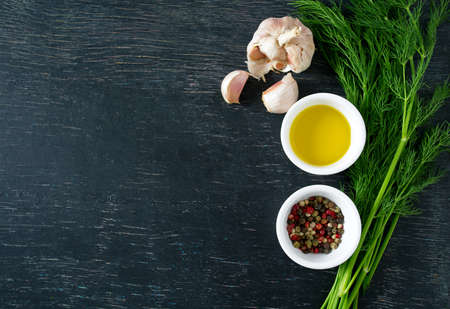 spices and herbs on black chalkboardの写真素材