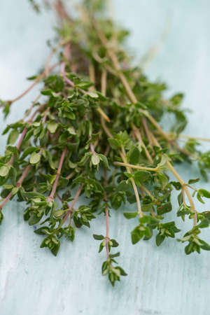 thyme on wooden surface