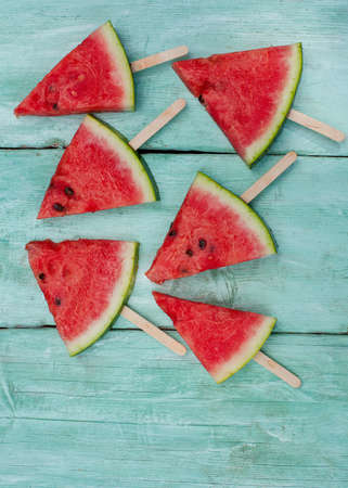 watermelon pops for a picnic on turquoise backgroundの写真素材