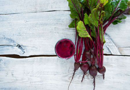 beetroot juice on wooden surfaceの写真素材
