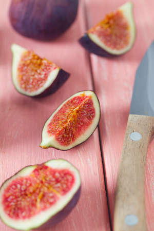 fresh figs on wooden surface