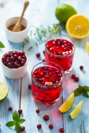 cranberry drink on wooden surfaceの写真素材