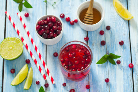 cranberry drink on wooden surface