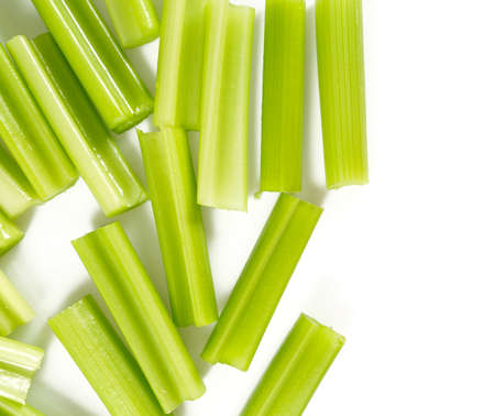 celery sticks isolated on whiteの写真素材