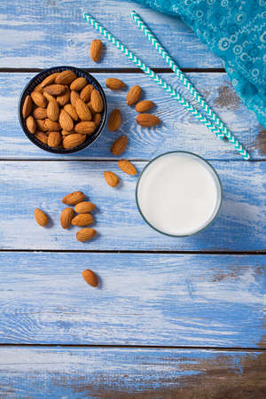 almond milk on blue backgroundの写真素材