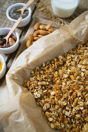 home made granola on wooden surface surfaceの写真素材