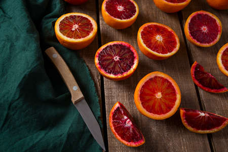 blood orange on wooden surfaceの写真素材