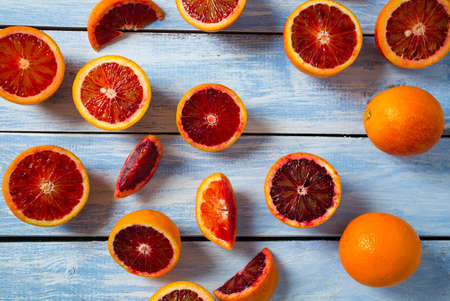 blood orange on wooden surfaceの写真素材