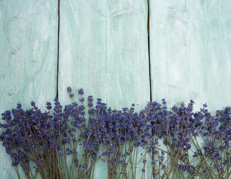 lavender flowers on wooden surfaceの写真素材