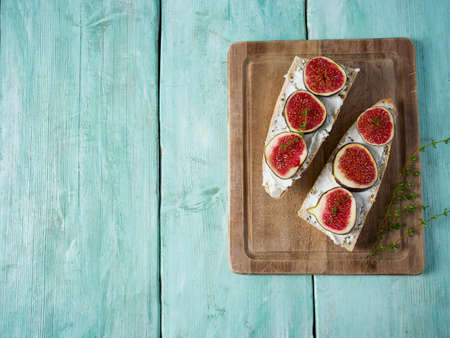 whole bread with cheese and figsの写真素材