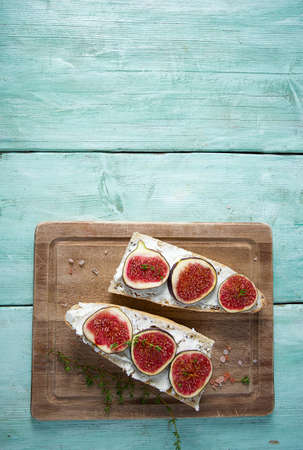 whole bread with cheese and figsの写真素材