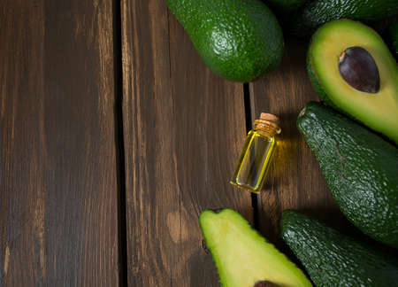 avocado oil on wooden surface
