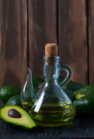 avocado oil on wooden surfaceの写真素材