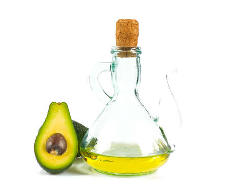 Avocado oil isolated on whiteの写真素材