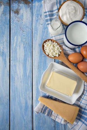dairy products on wooden surfaceの写真素材