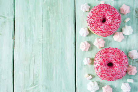doughnut on wooden surfaceの写真素材