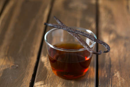 vanilla extract on wooden surface