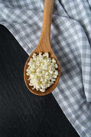 butter on black stone surface