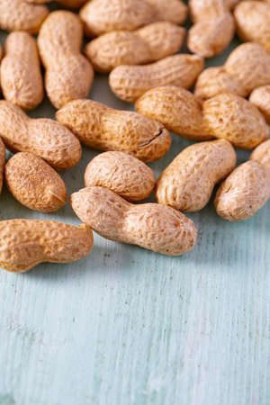 peanuts on wooden surfaceの写真素材