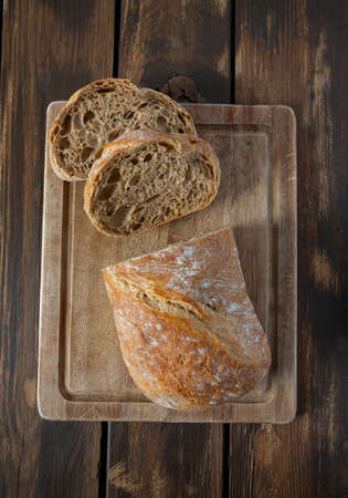 ciabatta on wooden surface