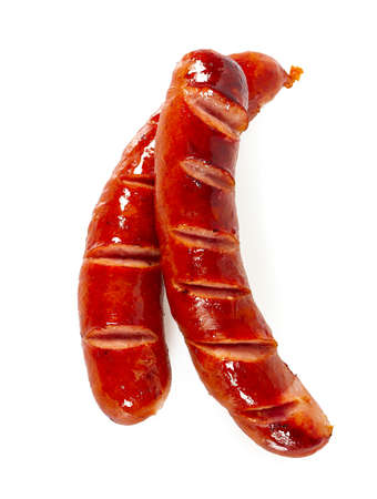 Grilled sausages isolated on a whiteの写真素材