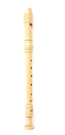 wooden flute isolated on whiteの写真素材