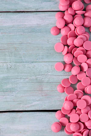 strawberry chocolate chips on turquoise surface