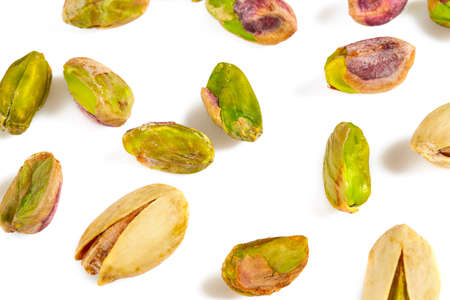 pistachio nuts isolated on white backgroundの写真素材