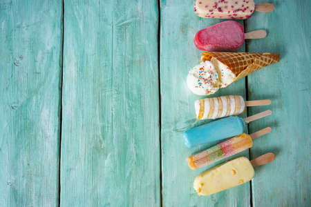 Ice cream variety on a turquoise surfaceの写真素材