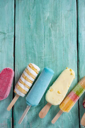 Ice cream variety on a turquoise surfaceの写真素材