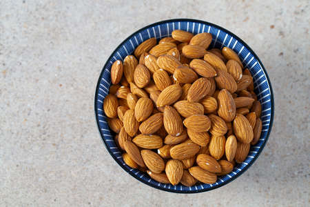 almond nuts on granite backgroundの写真素材