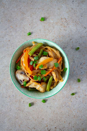 asian noodles with vegetables and mushroomsの写真素材