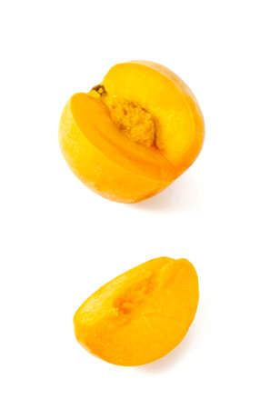yellow peach isolated on whiteの写真素材